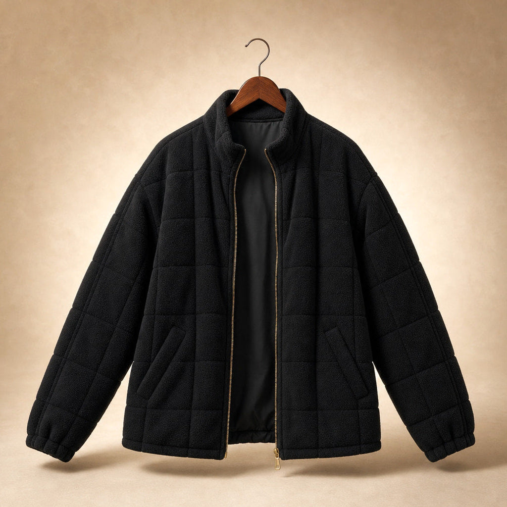 Lotte | Steppjacke mit schmalen Steppkanälen und lockerer Passform Schwarz – Produktfoto