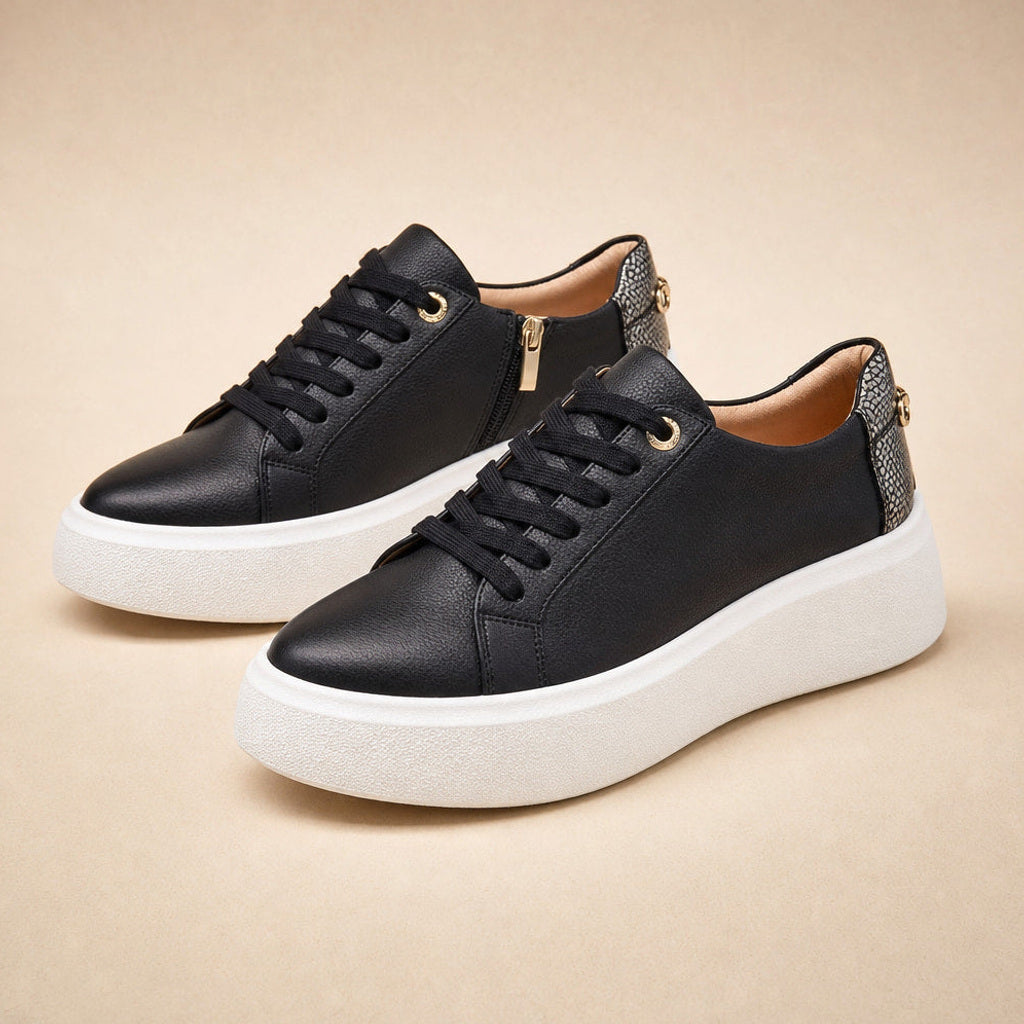 Lungunde | Plateau Sneaker mit Zierkette an der Ferse in Schwarz – Premium Editorial